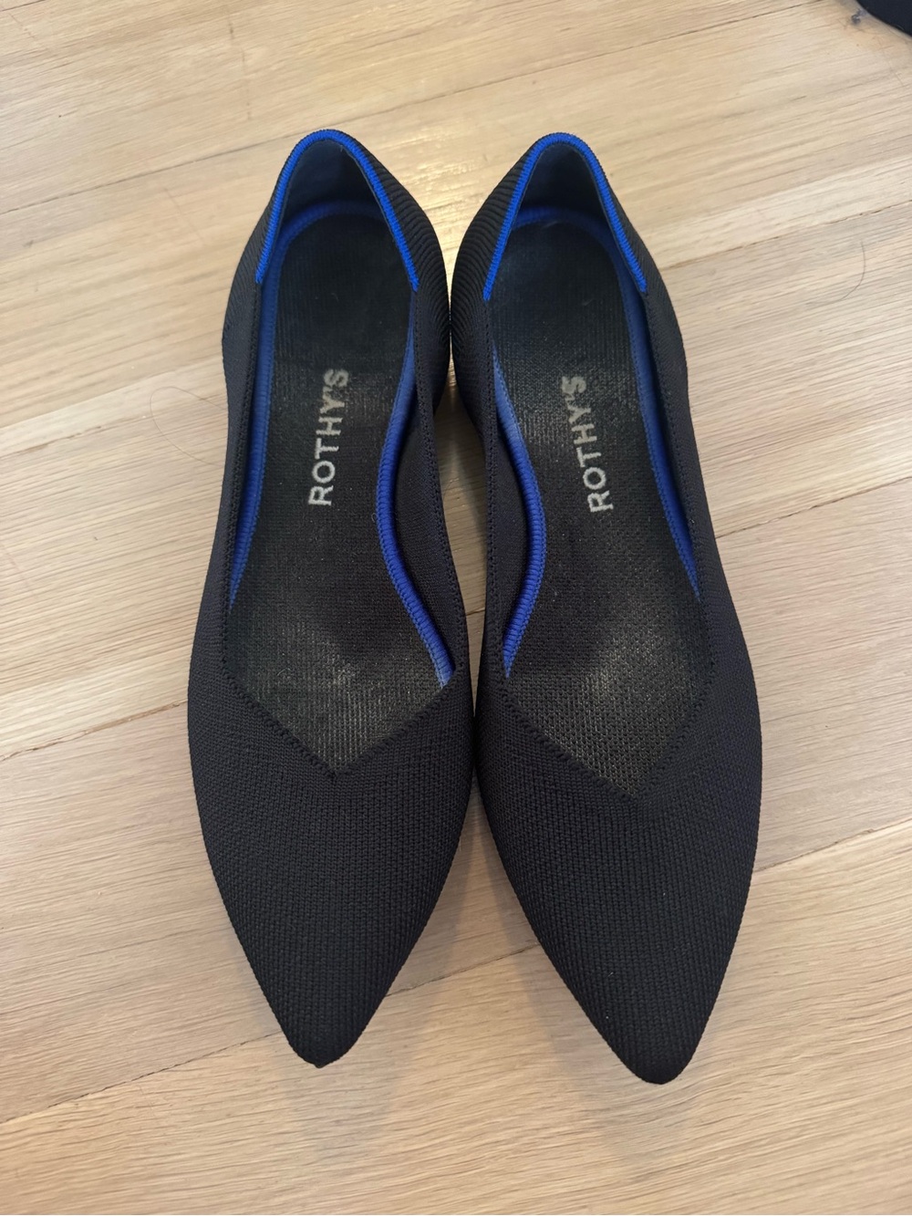 Rothy's Black Pointed Flats with Blue Trim